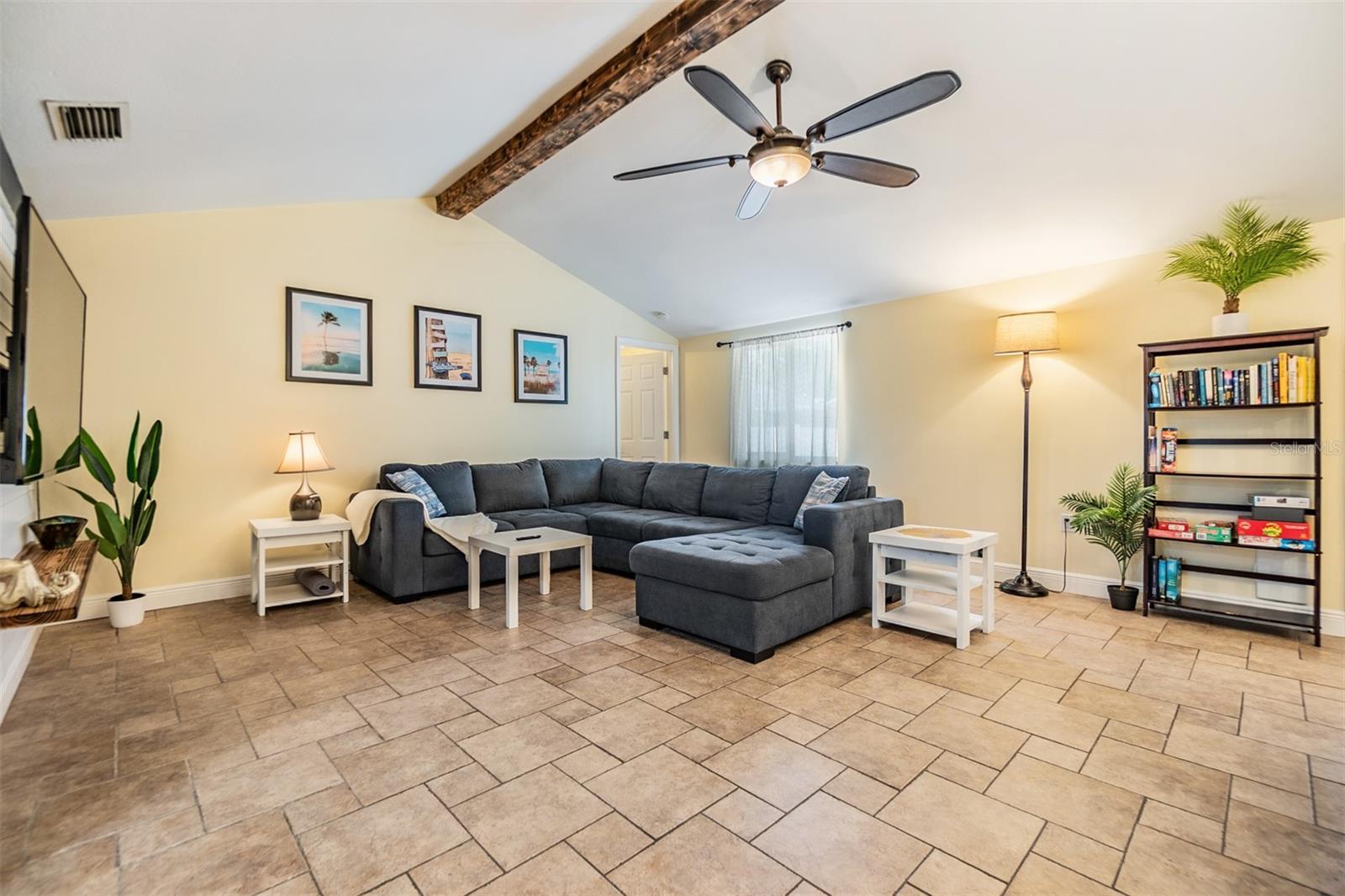 Family Room, High ceilings and tile flooring