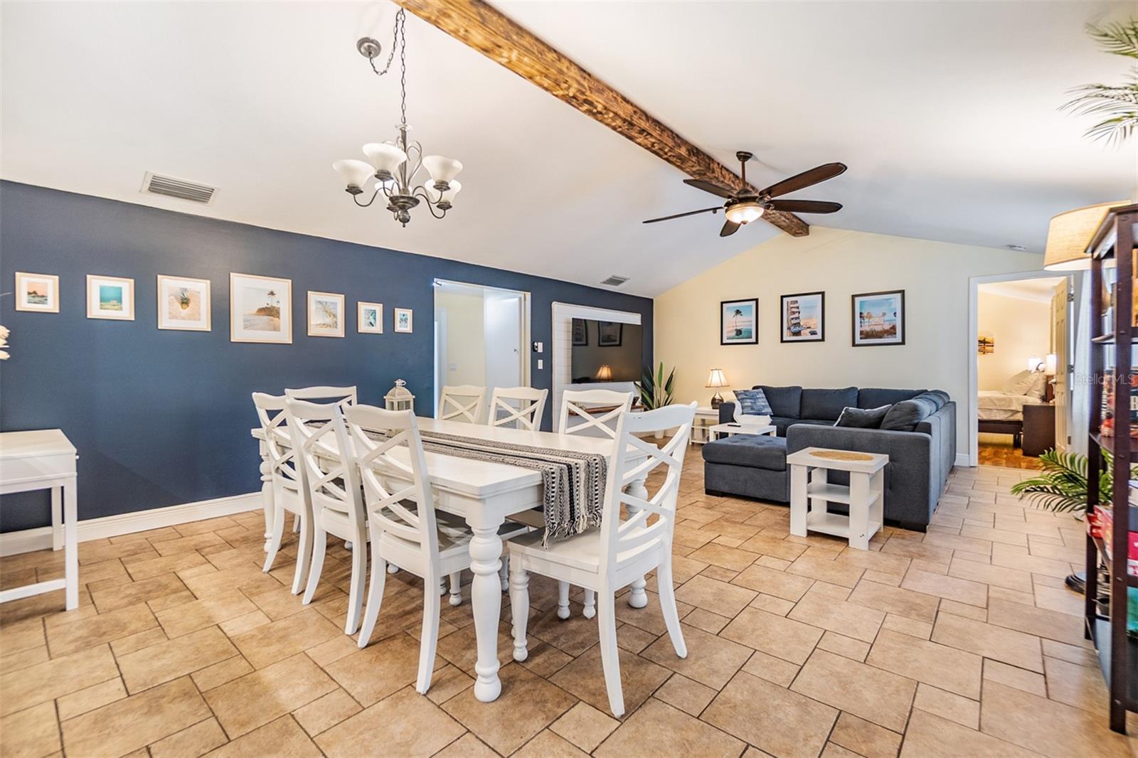 Vaulted Ceilings, Dining Room, and French doors to the outside, tile flooring.