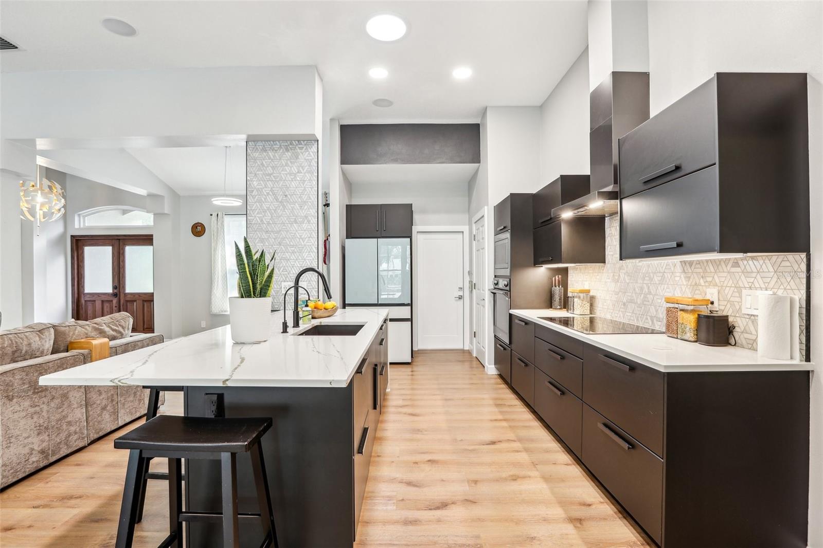 Designer quartz with waterfall island