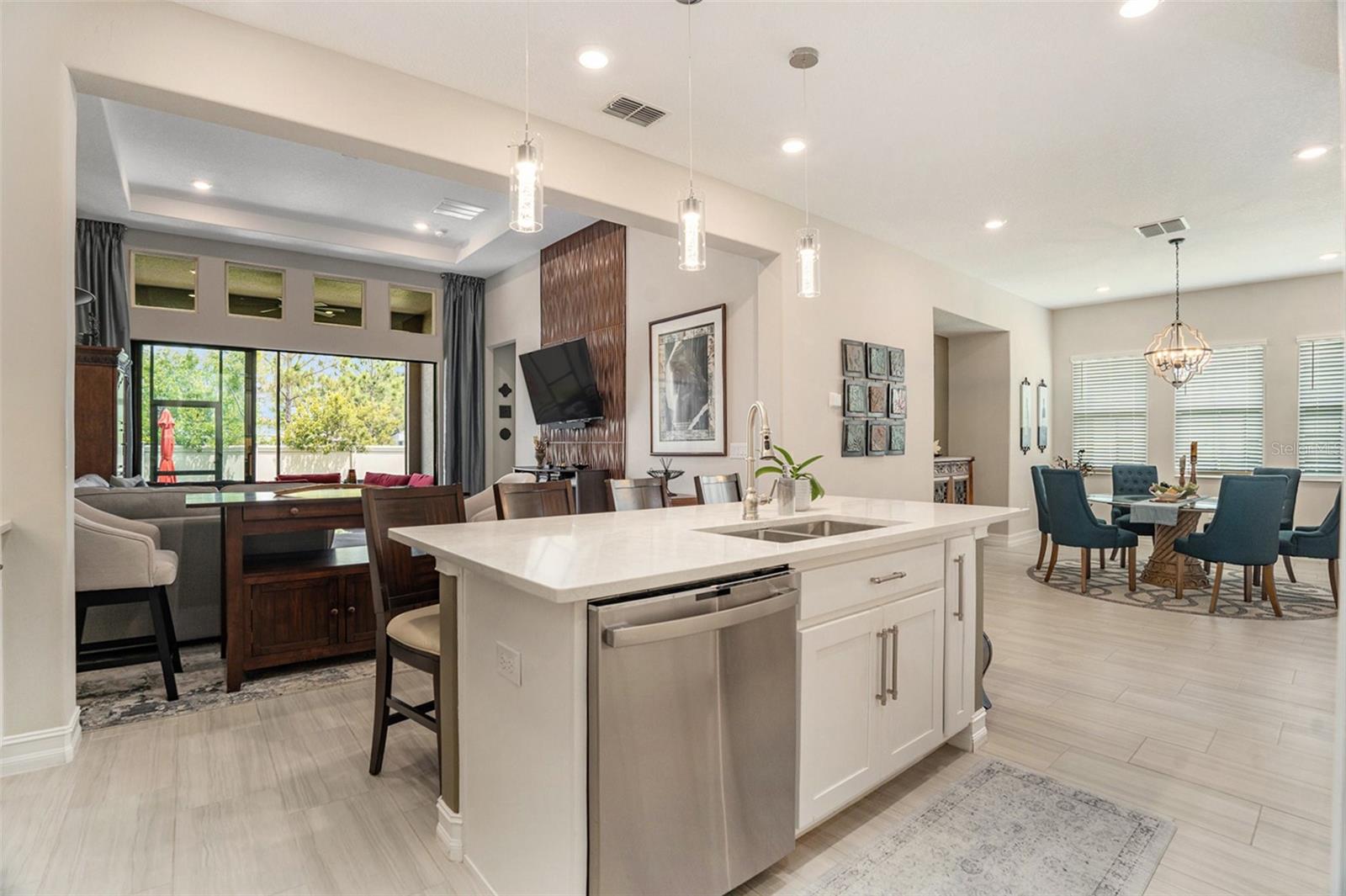 Kitchen overlooking dining and living areas