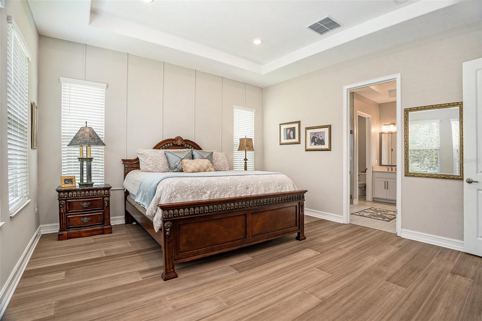Primary bedroom with Bamboo wood floors