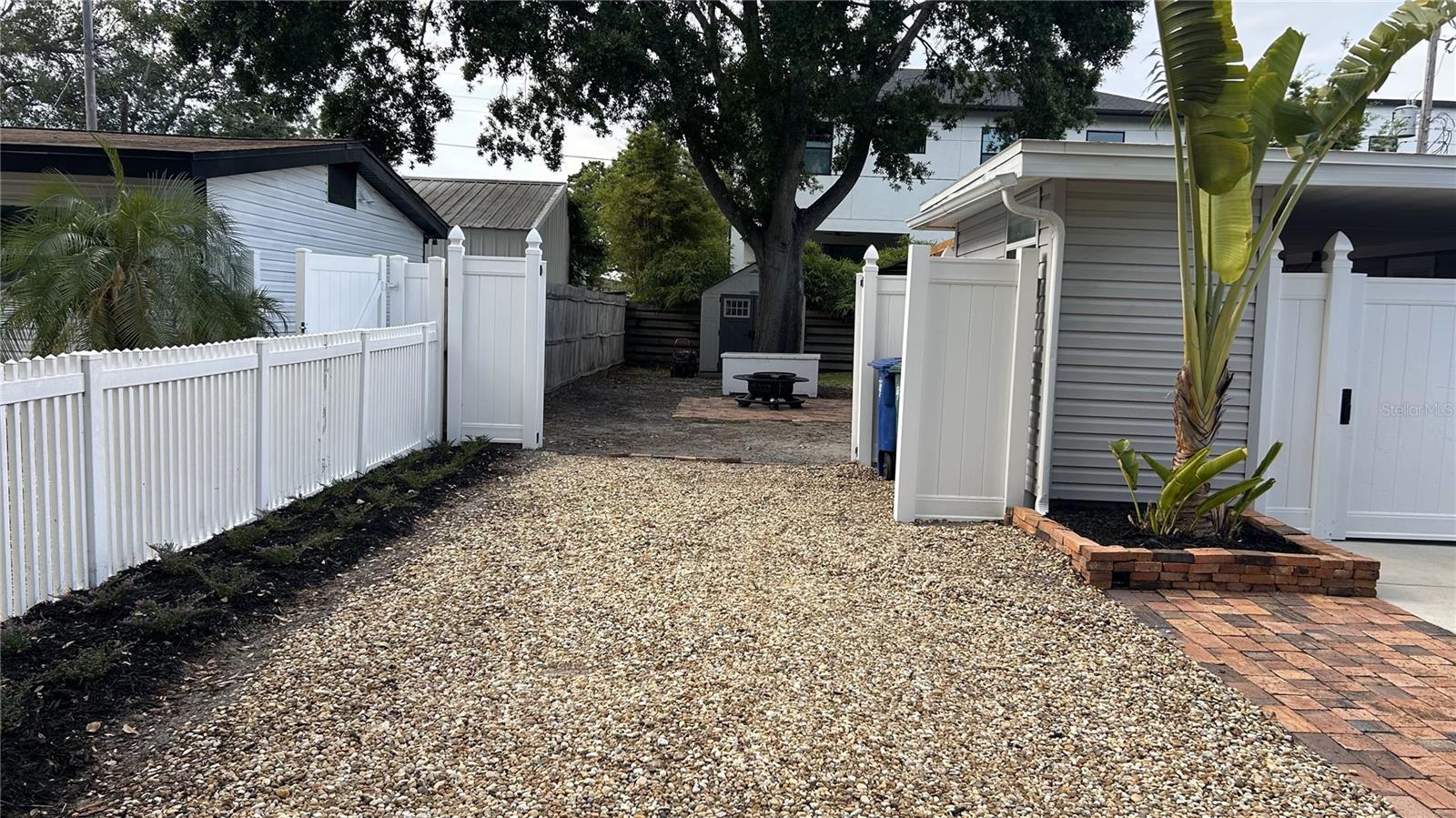 Fence  entry and Driveway for additional parking