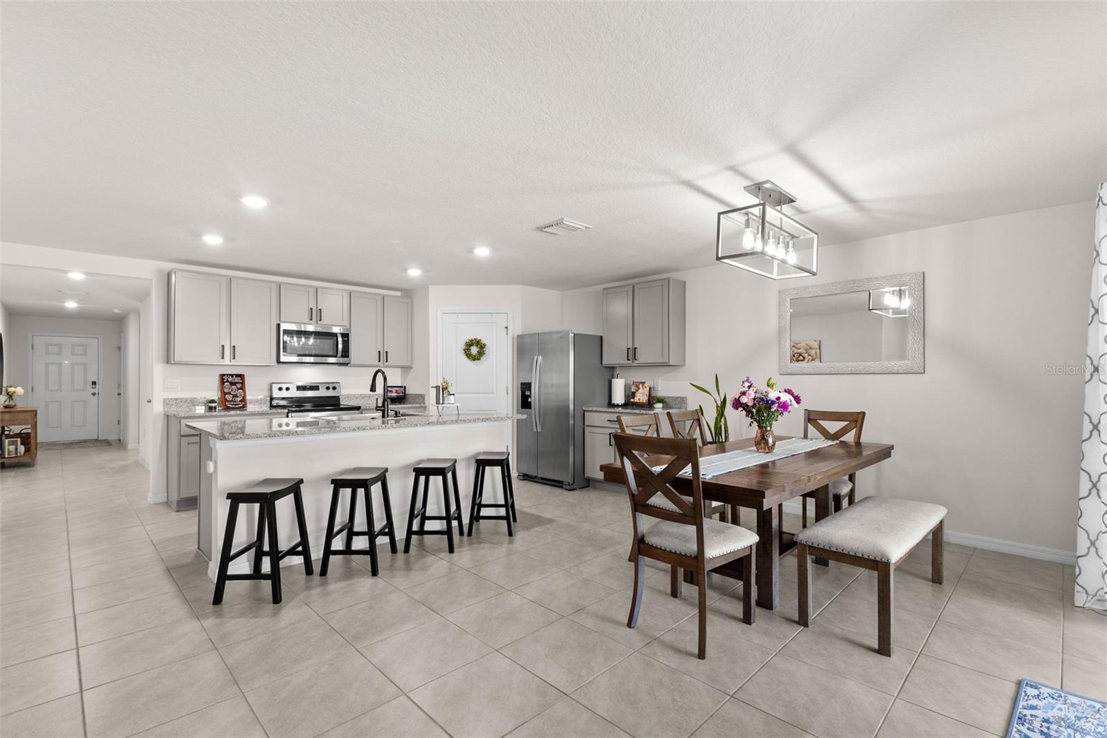 kitchen opens to dining area