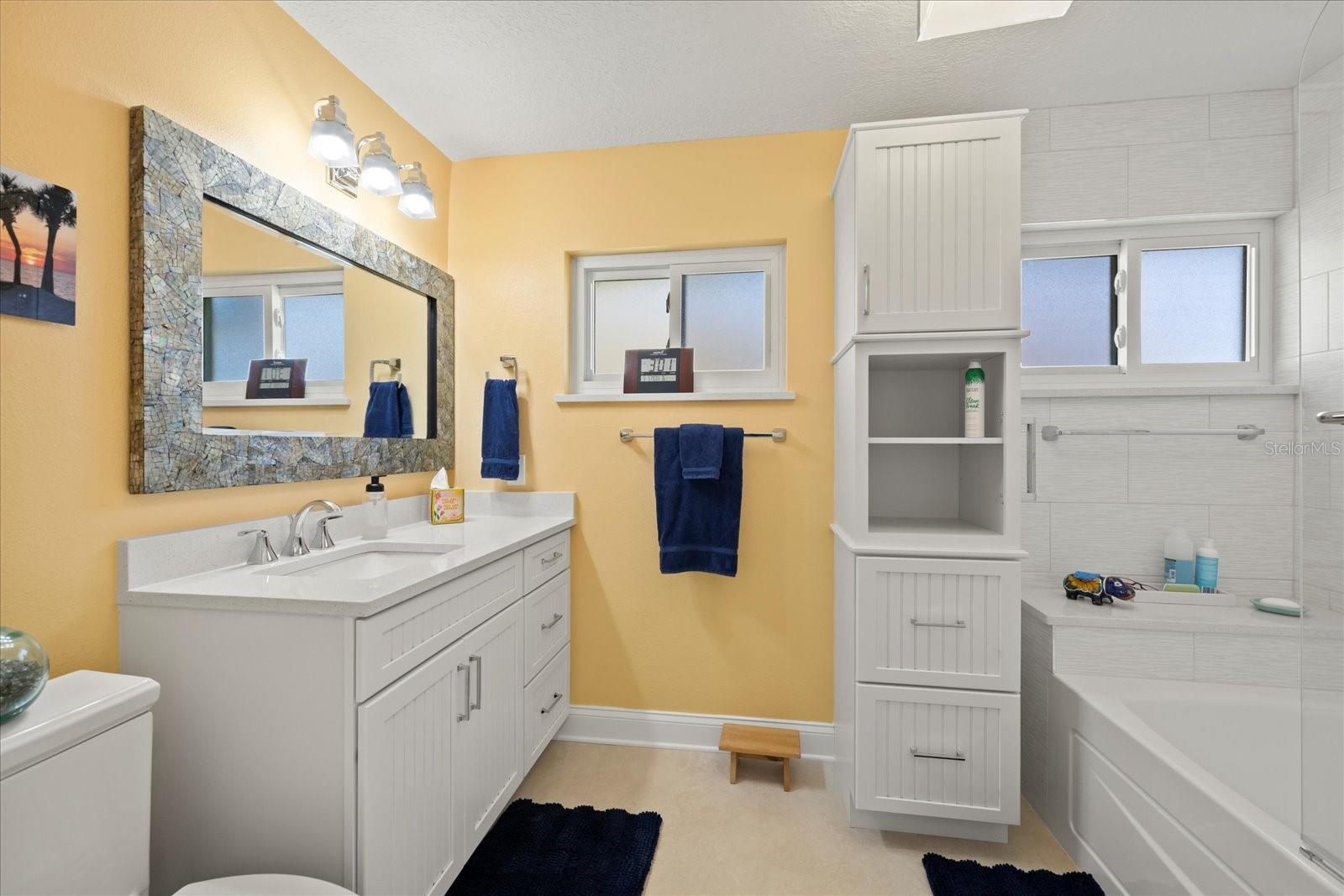 Secondary Hall Bathroom with tub and shower