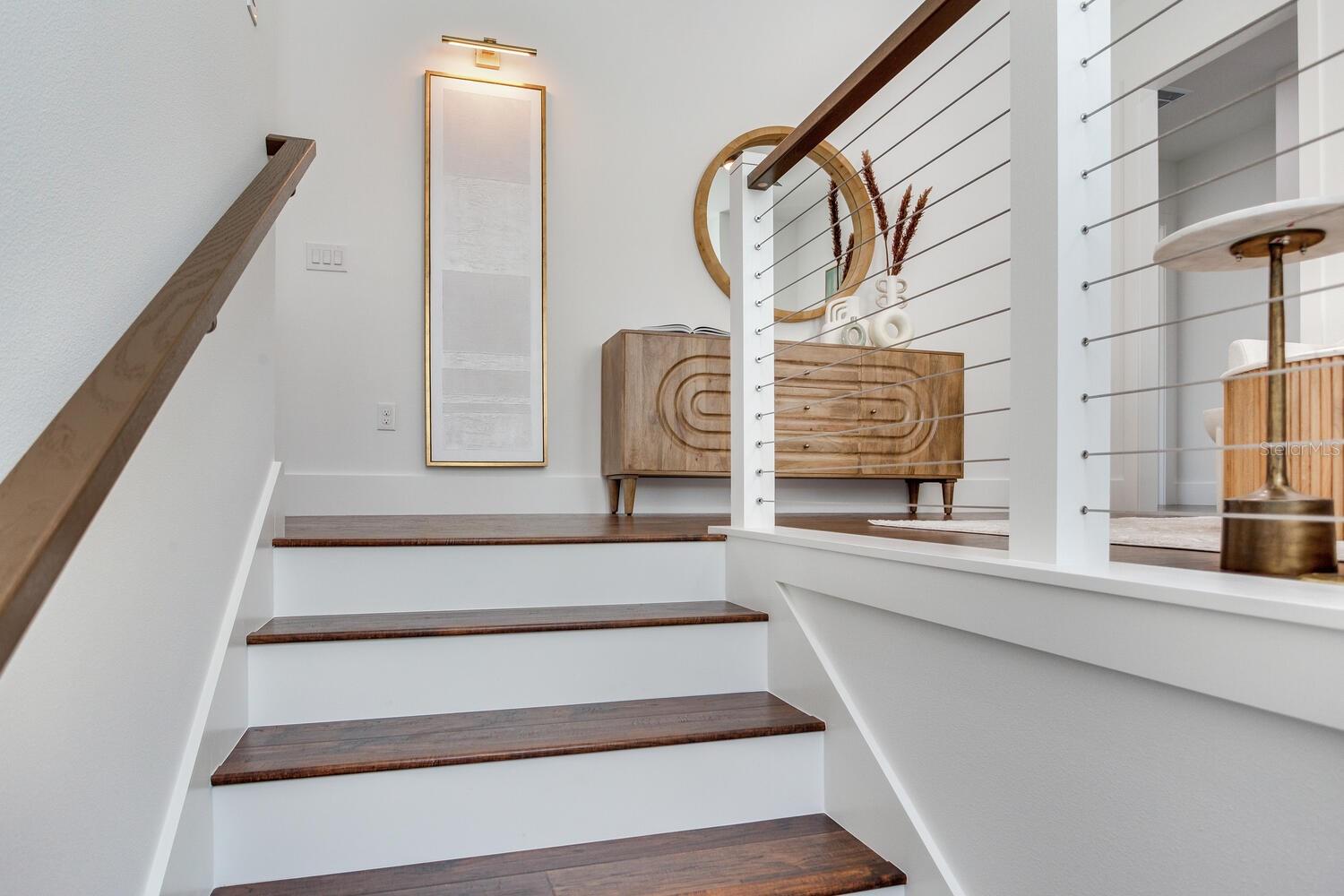A cable rail system creates an open space in the loft
