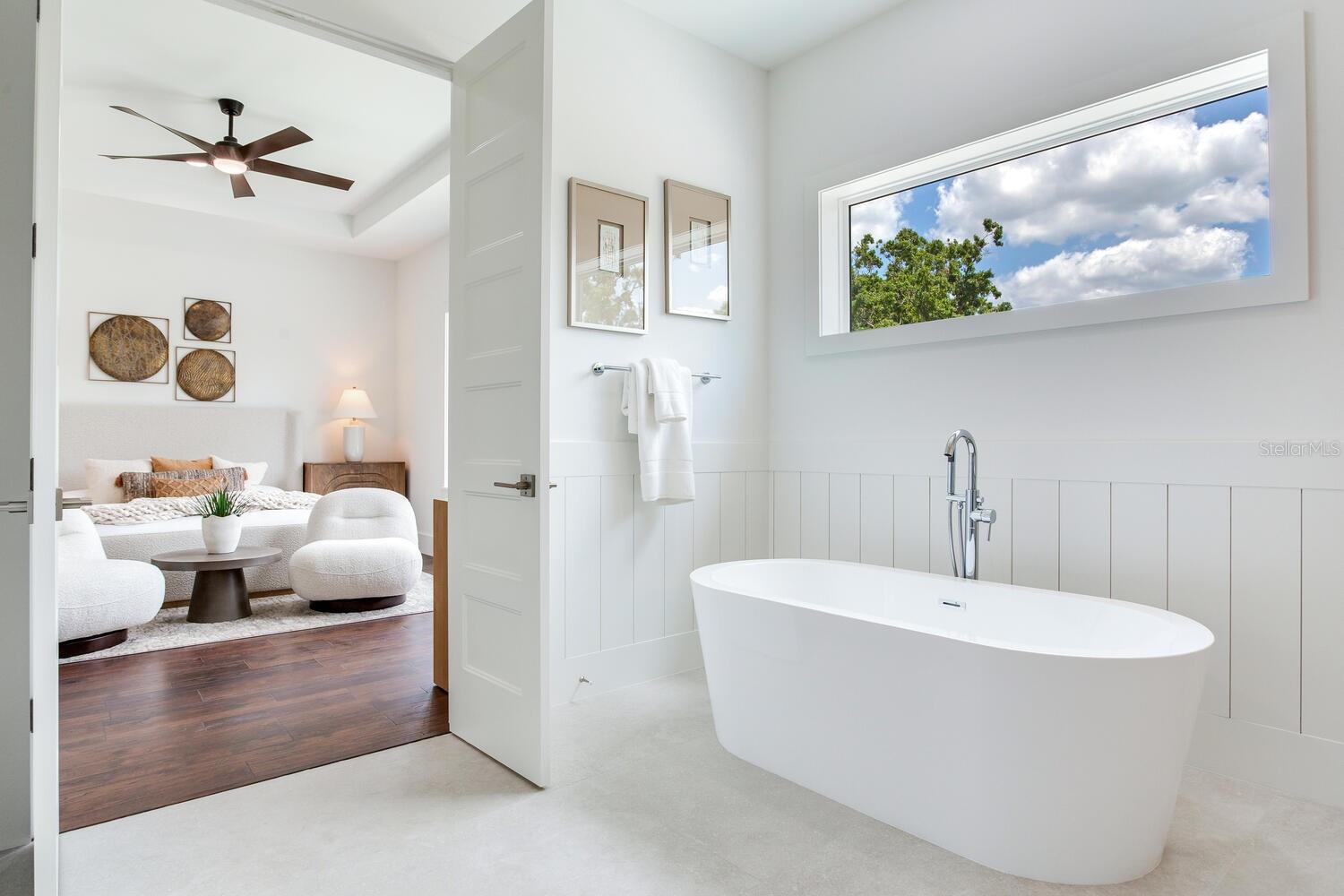 bathroom looking out to bedroom area