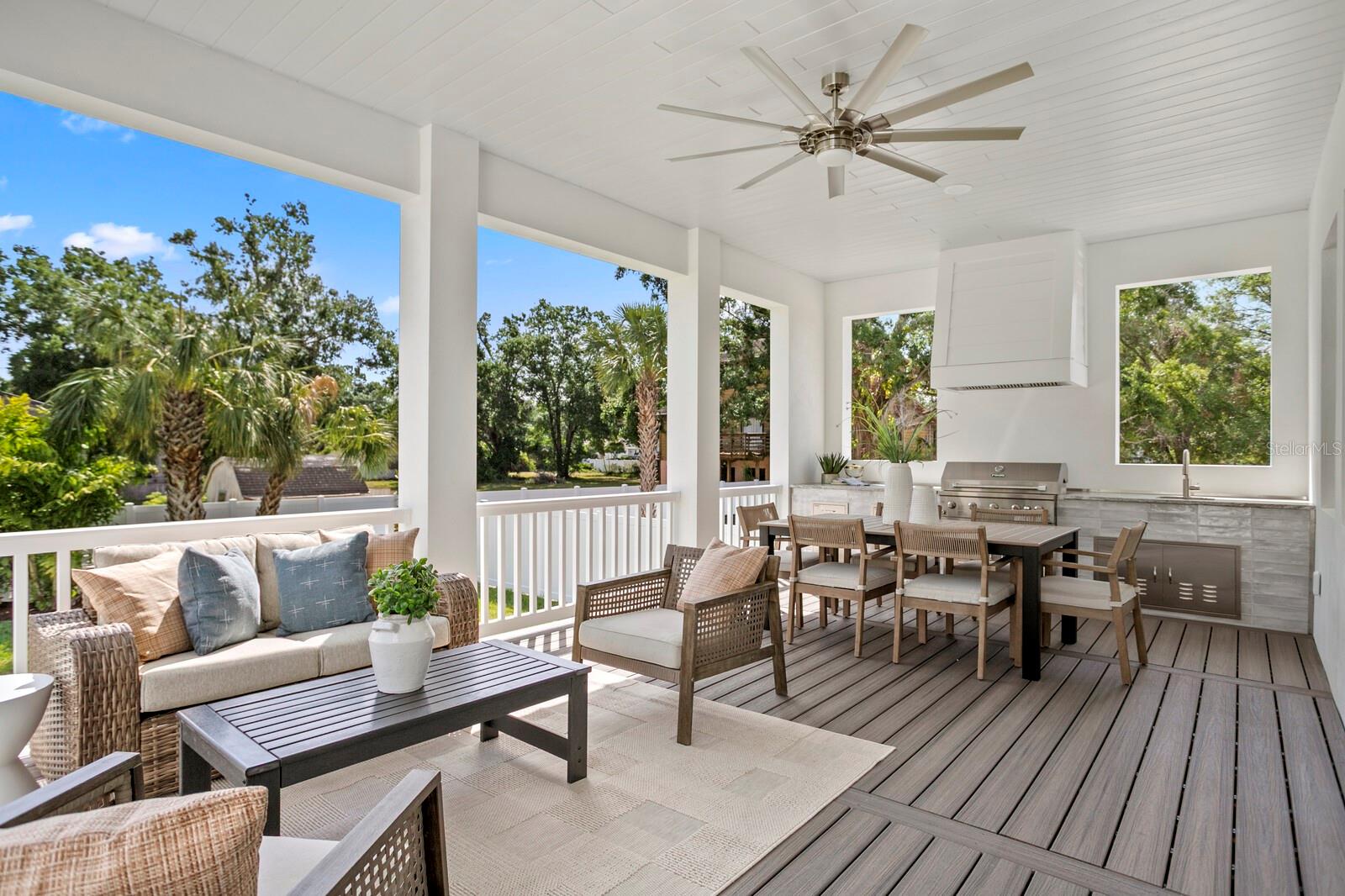 Vast deck area in the back of the home offers abundant seating areas