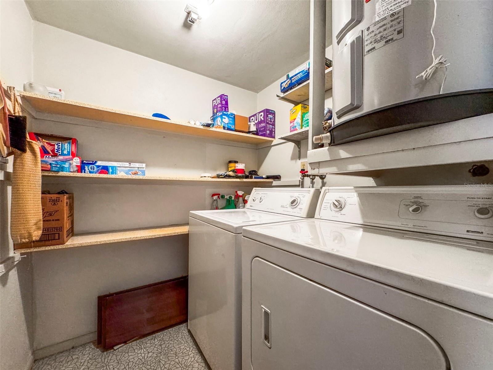 Full size washer & dryer inside utility room