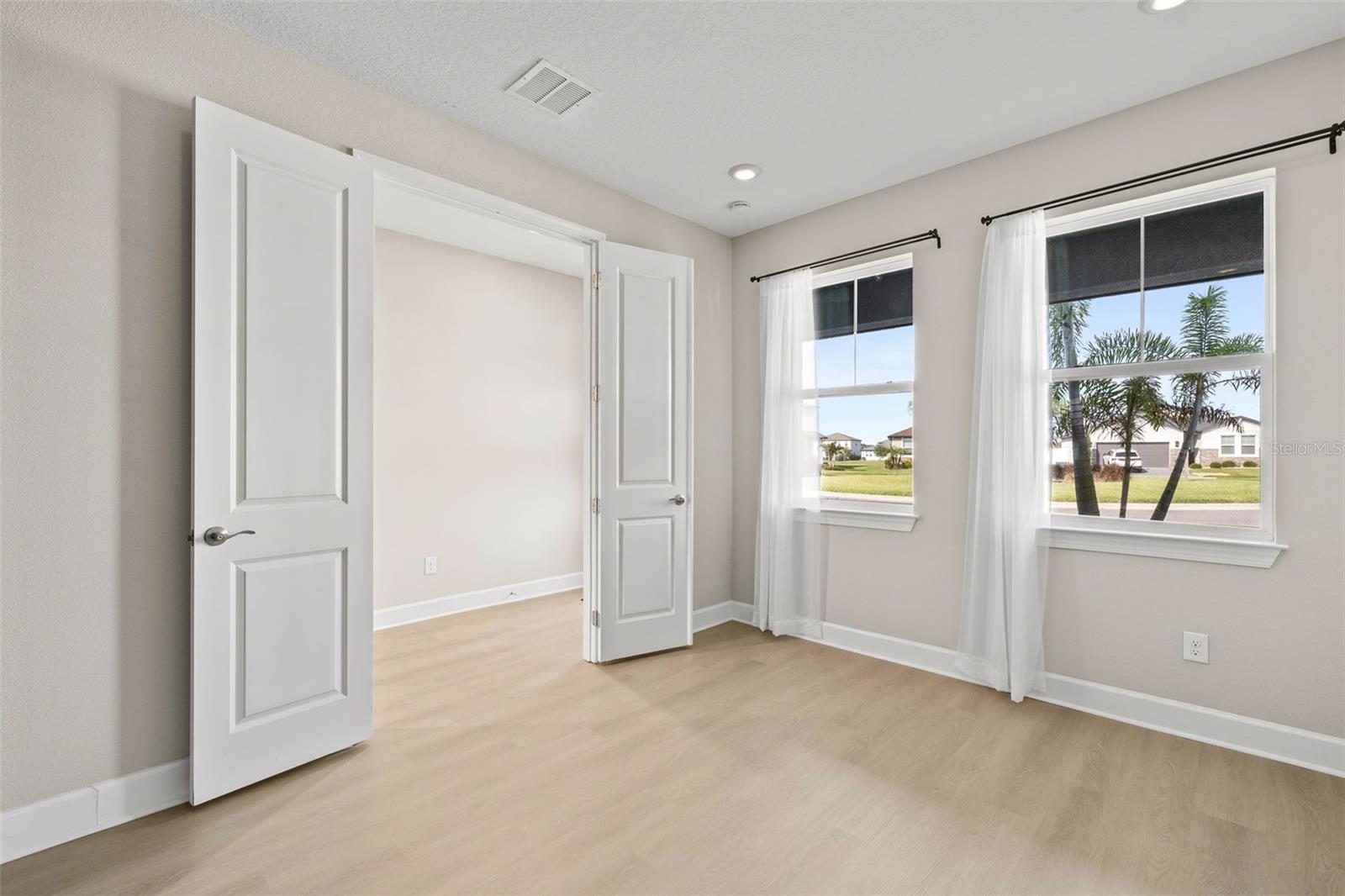 First floor office adds an extra flex space with double doors for added privacy.