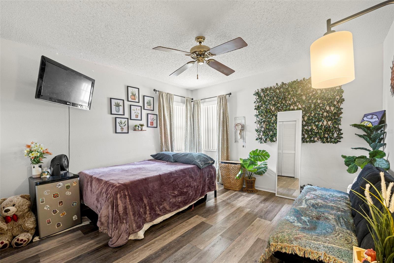 View of secondary bedroom. This home offers a highly desirable split bedroom floor plan which provides ample privacy for family members and guests!