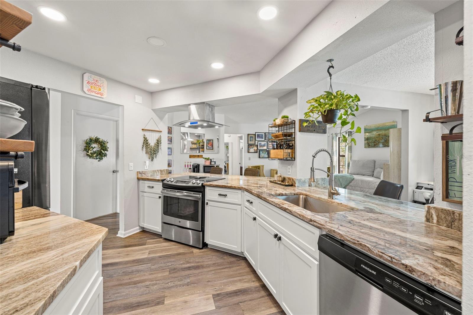 With this open floor plan...entertaining is a breeze!  Everyone ends up in the kitchen...and you're part of the party!