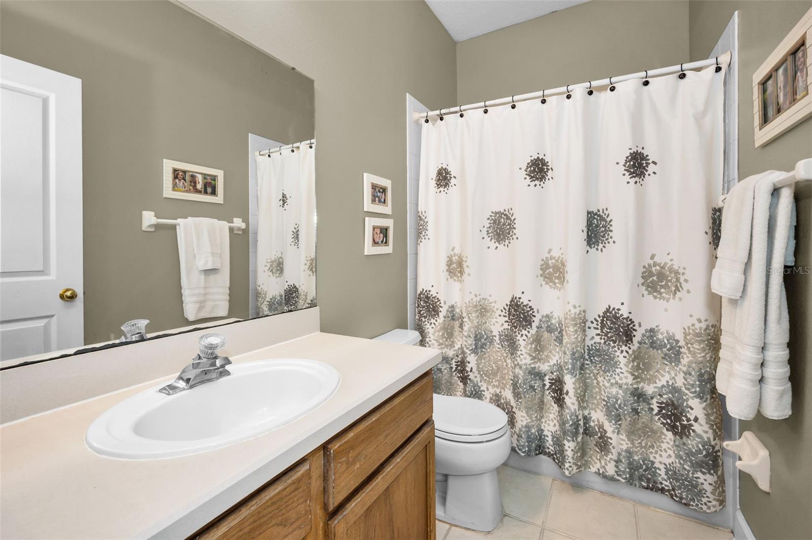 Upper Level Bathroom with bathtub