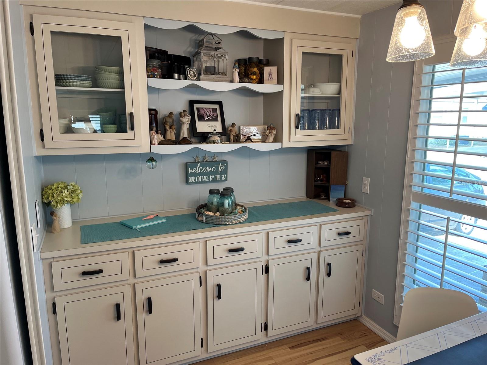 Plenty of storage off of kitchen, in dining room.