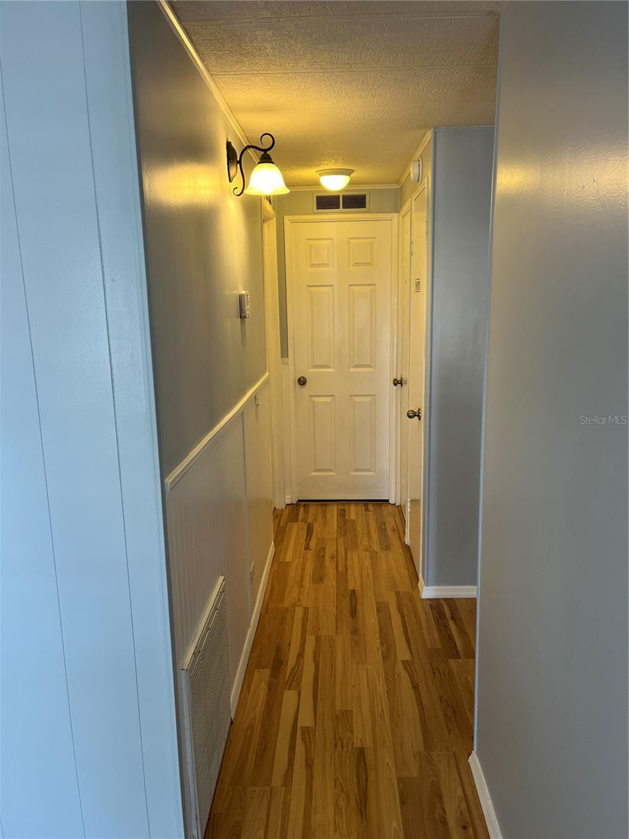 Hall to bedrooms and main bath.