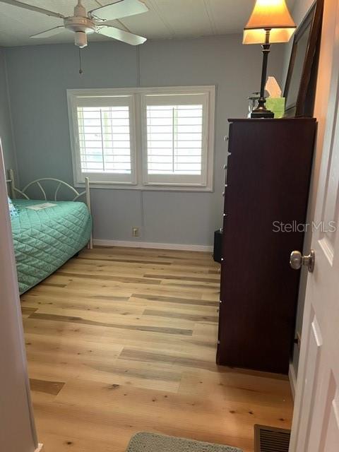 2nd bedroom with plantation shutters.