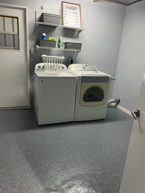 Upgraded and spacious laundry room.