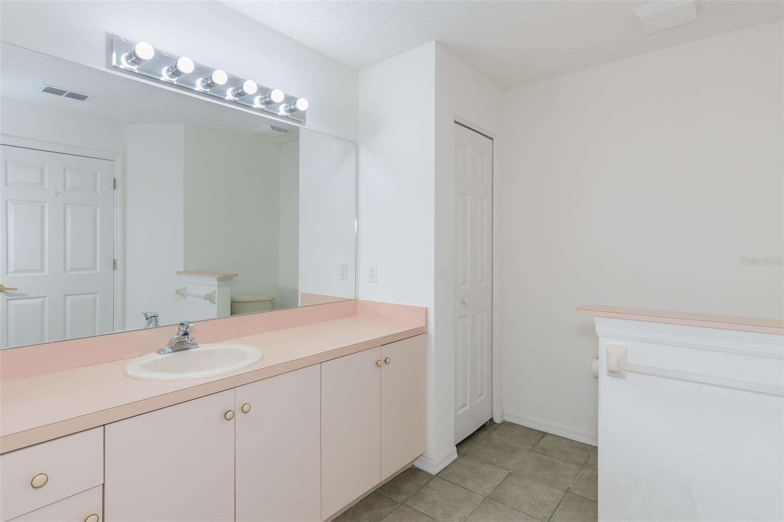 Primary Bathroom w/ Single Sink & Linen Closet
