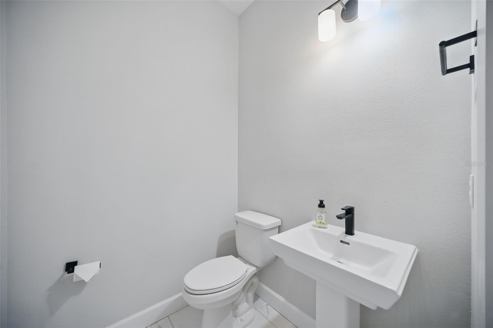 1/2 powder bath off of living room