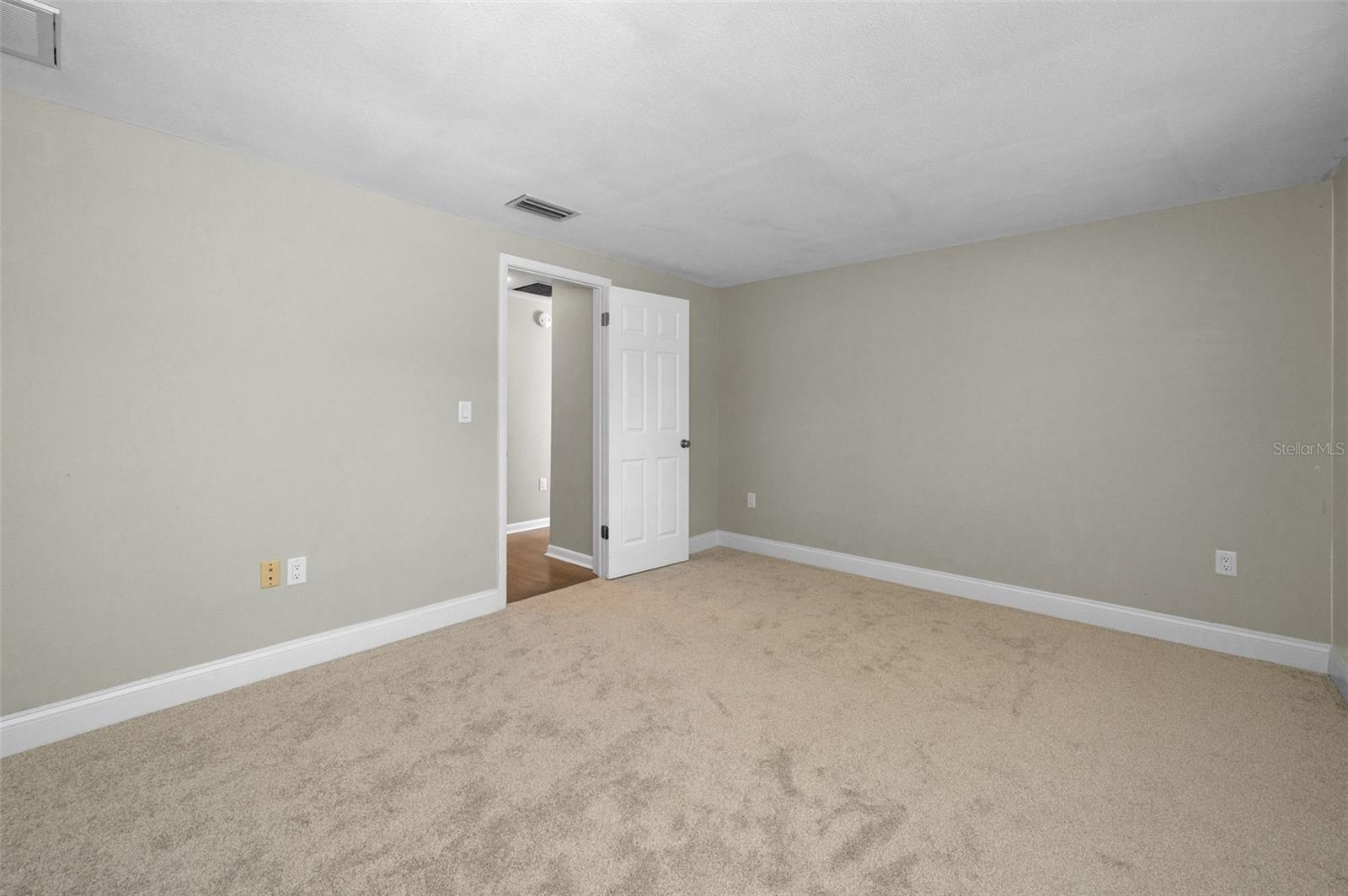 Bedroom 3 has brand new carpet and two closets.