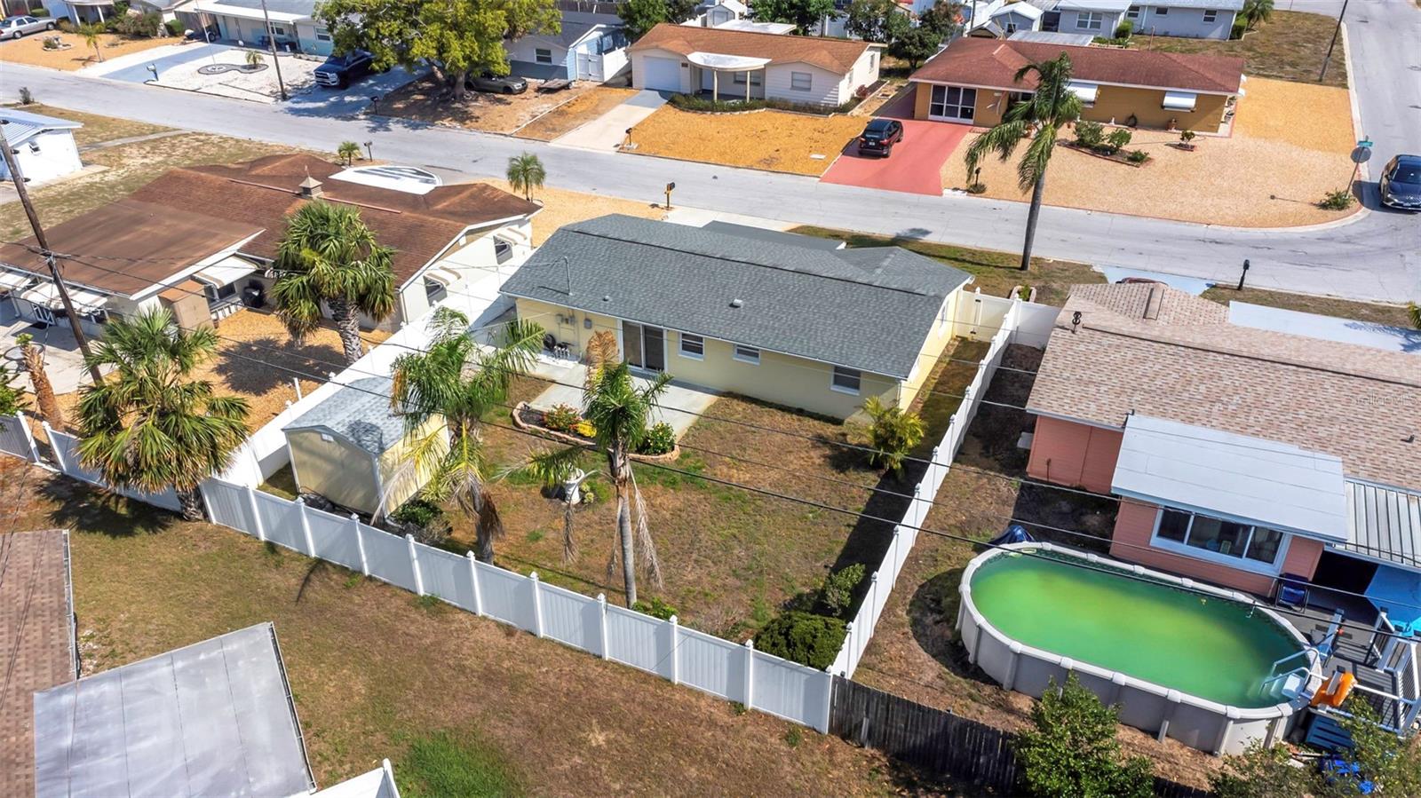 BIG BEAUTIFUL FENCED IN YARD WITH SHED