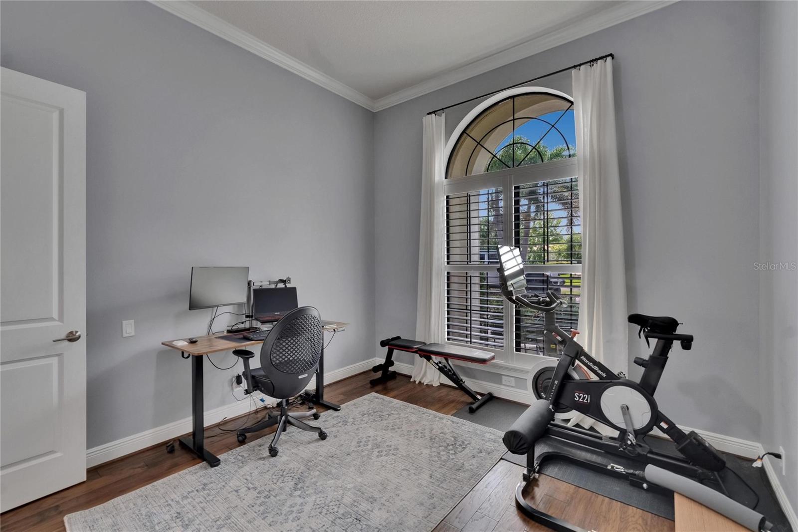 Home office adjacent to living room