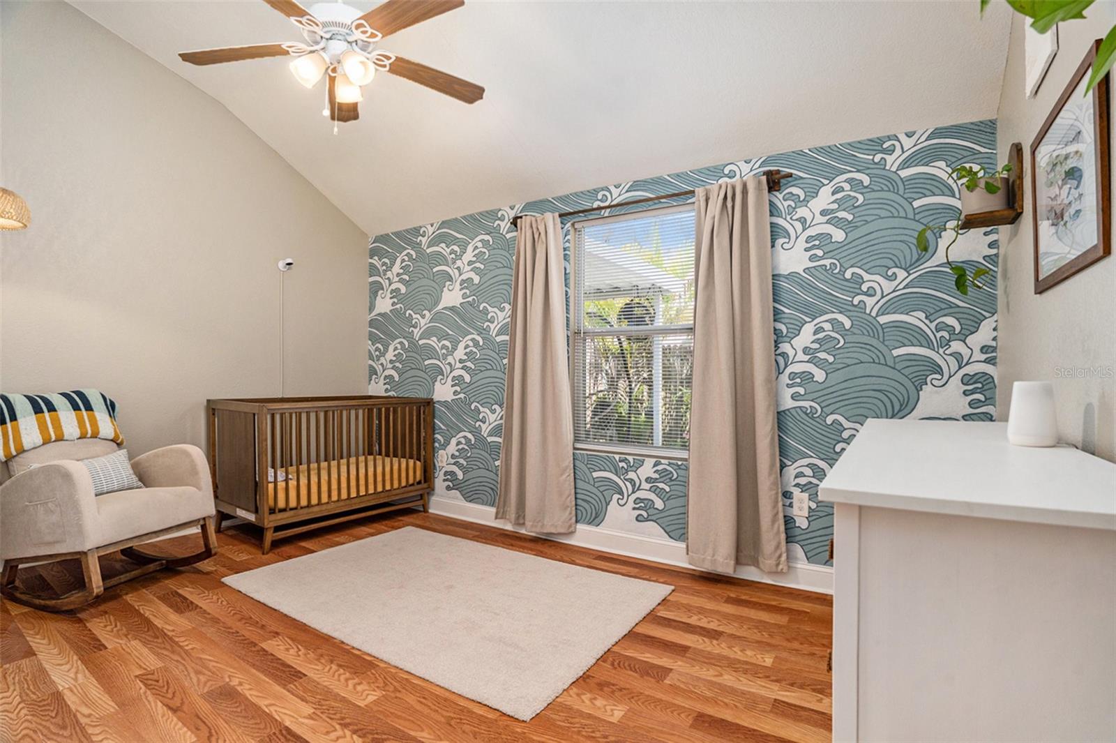Bedroom #2 features a hand-painted mural