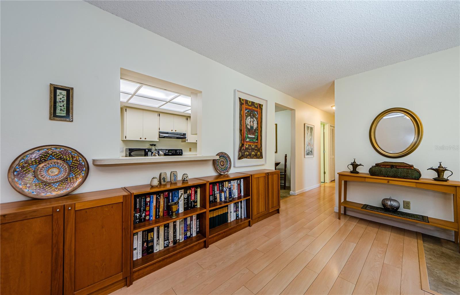 Entry to living and dining area & kitchen pass thru
