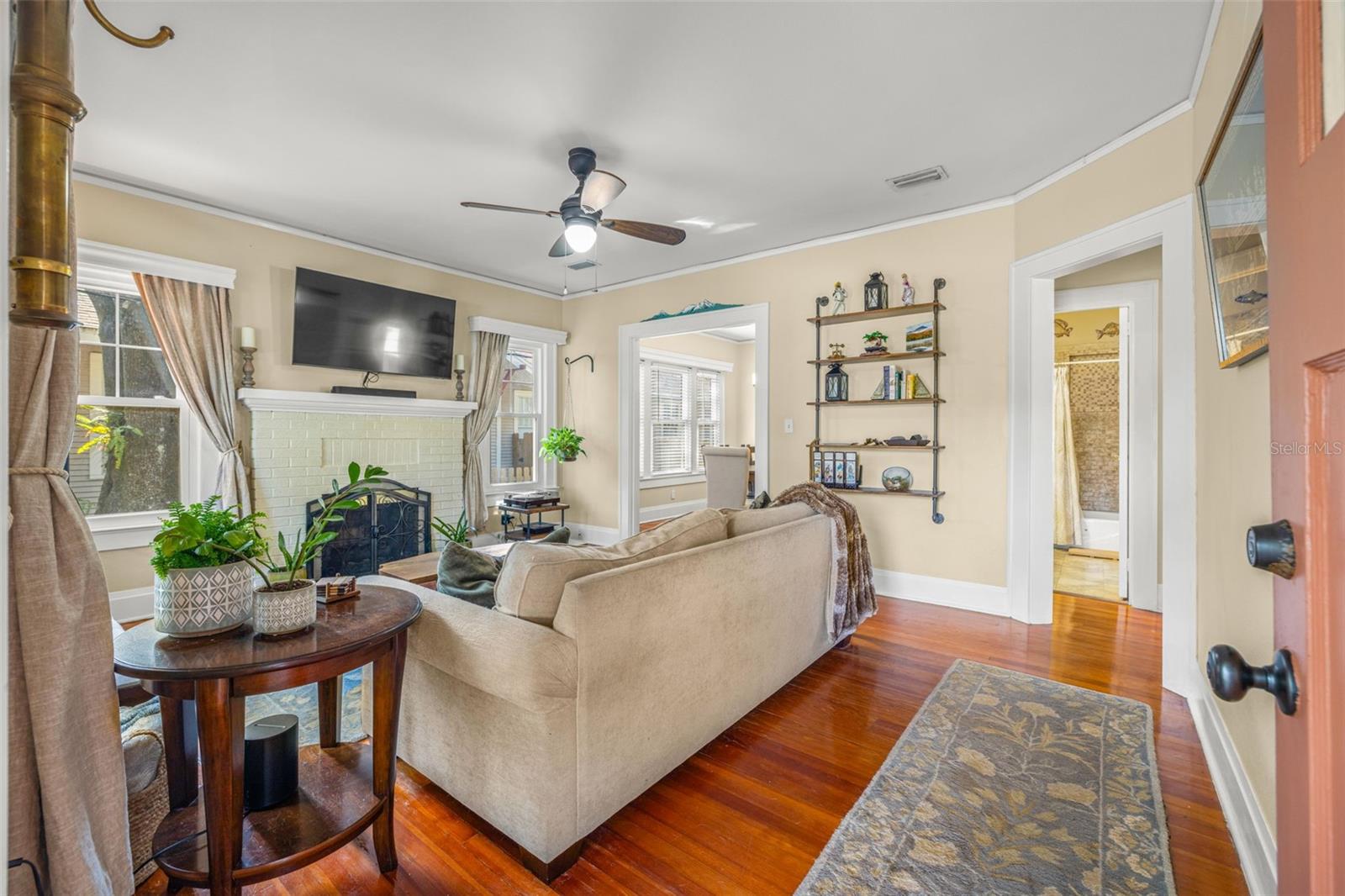 Original hardwood floors, fireplace and lots of natural light.