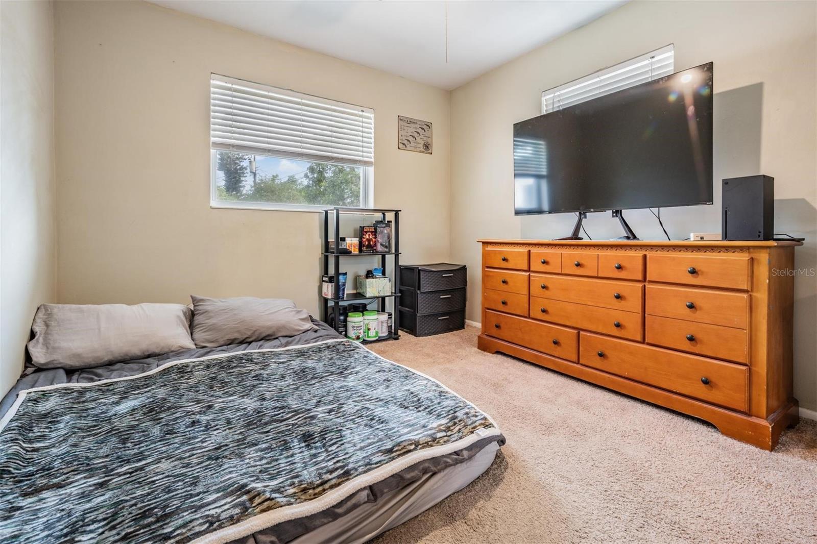 The third bedroom is spacious and flexible, perfect for a guest room, home office, or a personal retreat.