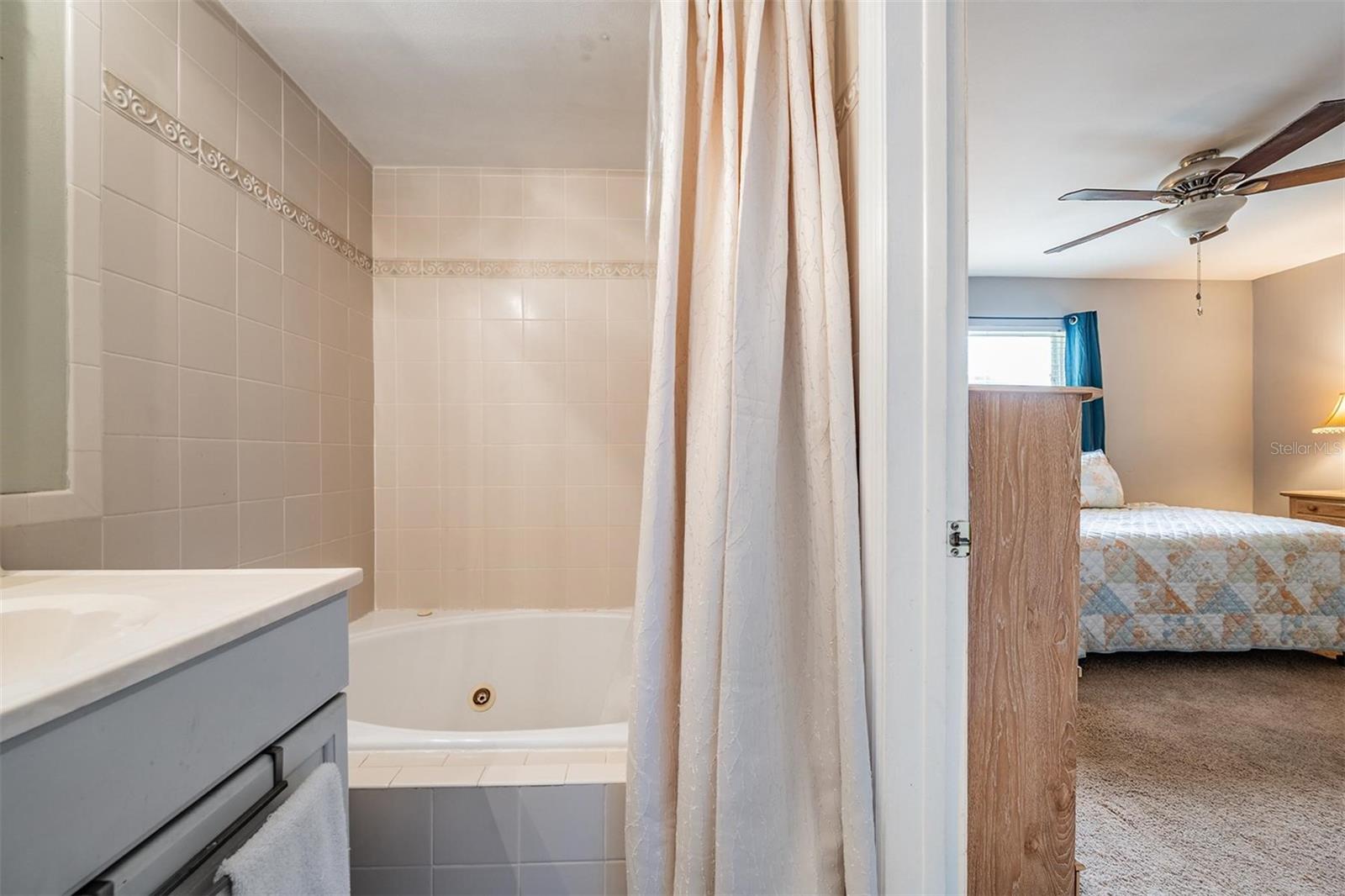 The Jacuzzi tub in the primary bath provides the perfect spot to relax and unwind after a long day.