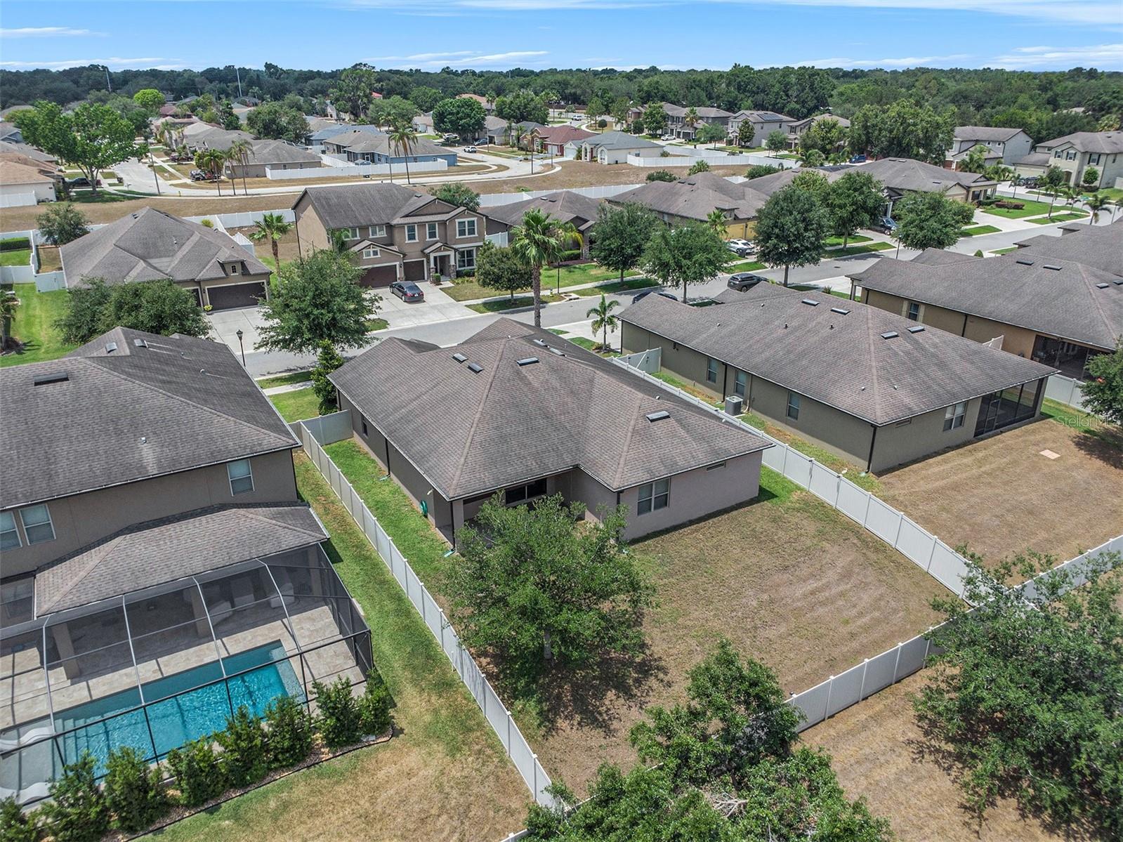 Fenced yard is perfect for a pool, pets, kids play space and more!  Visit today!