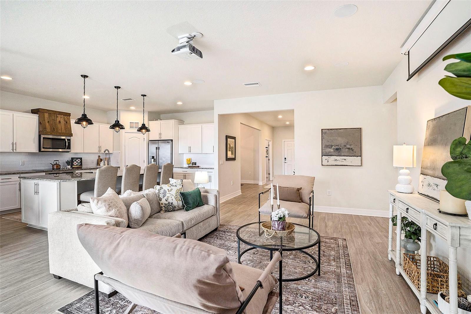 Great room and kitchen allows you to enjoy guests and family. Kitchen island has large cabinets/storage on both ends of the island, disguised as cabinets