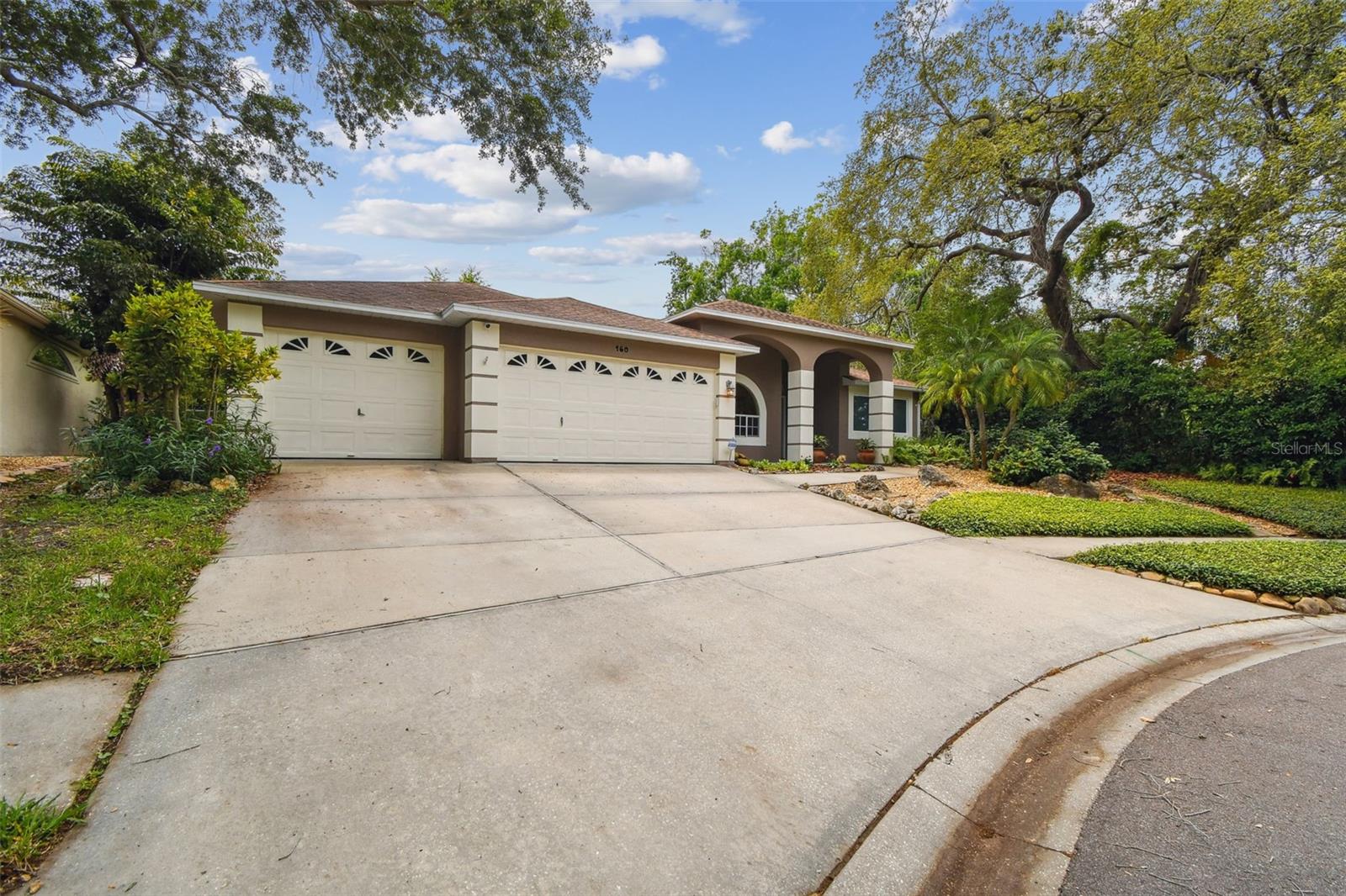 3 car garage with plenty of driveway parking for even more!