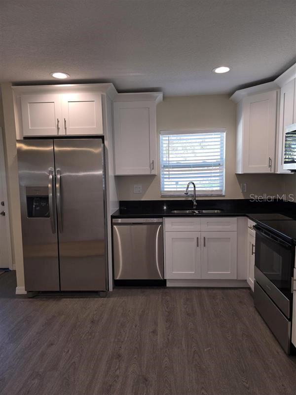 Kitchen with Granite Counters and Stainless Steel Appliances