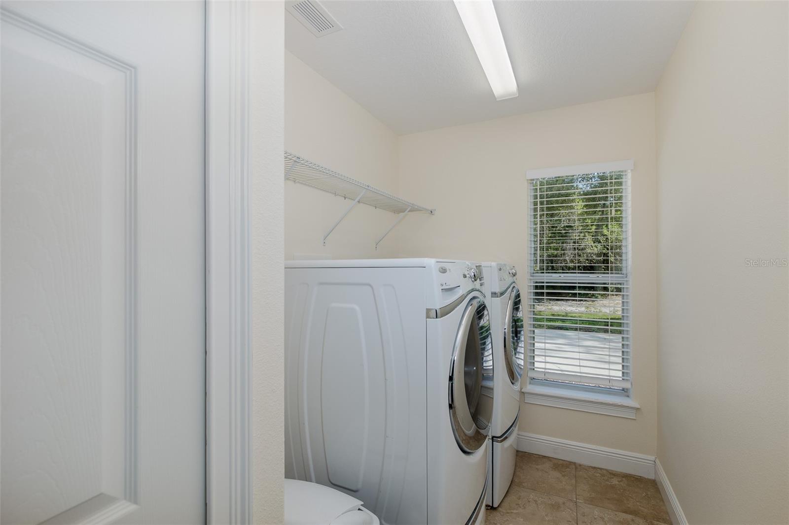 Laundry with pedestal appliances