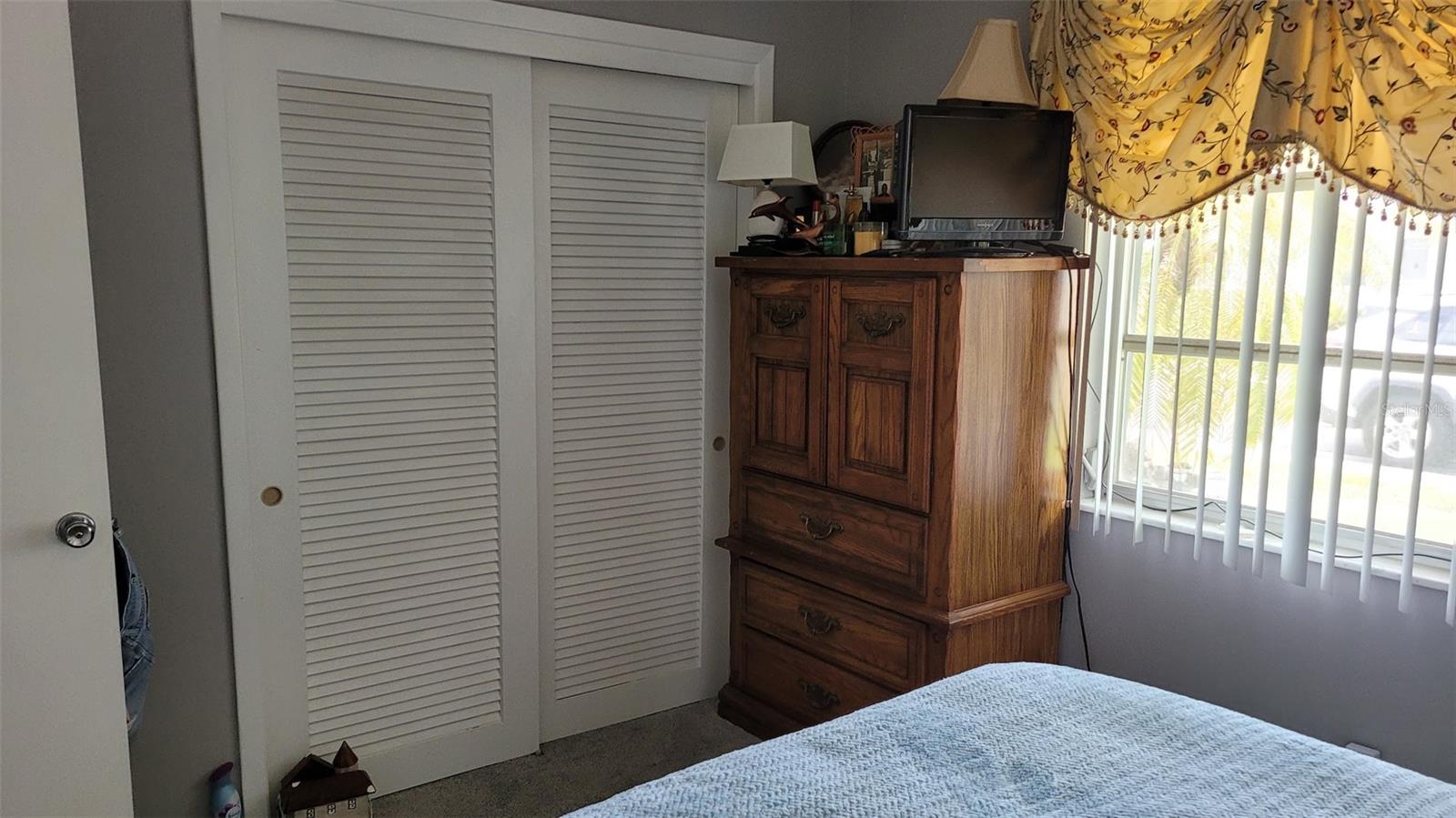 This Primary Bedroom has a built in closet.