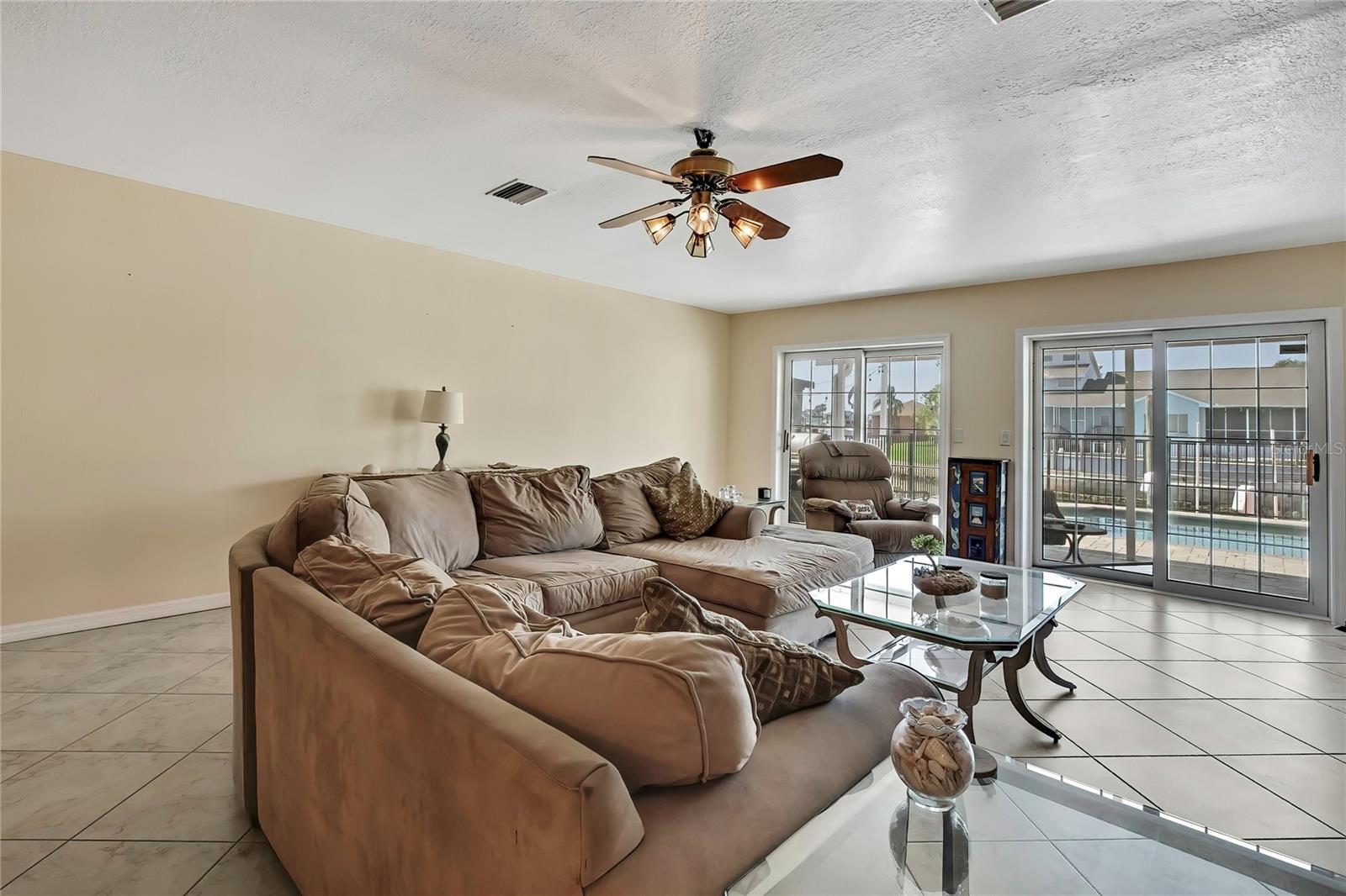 Ground floor with view of pool and canal