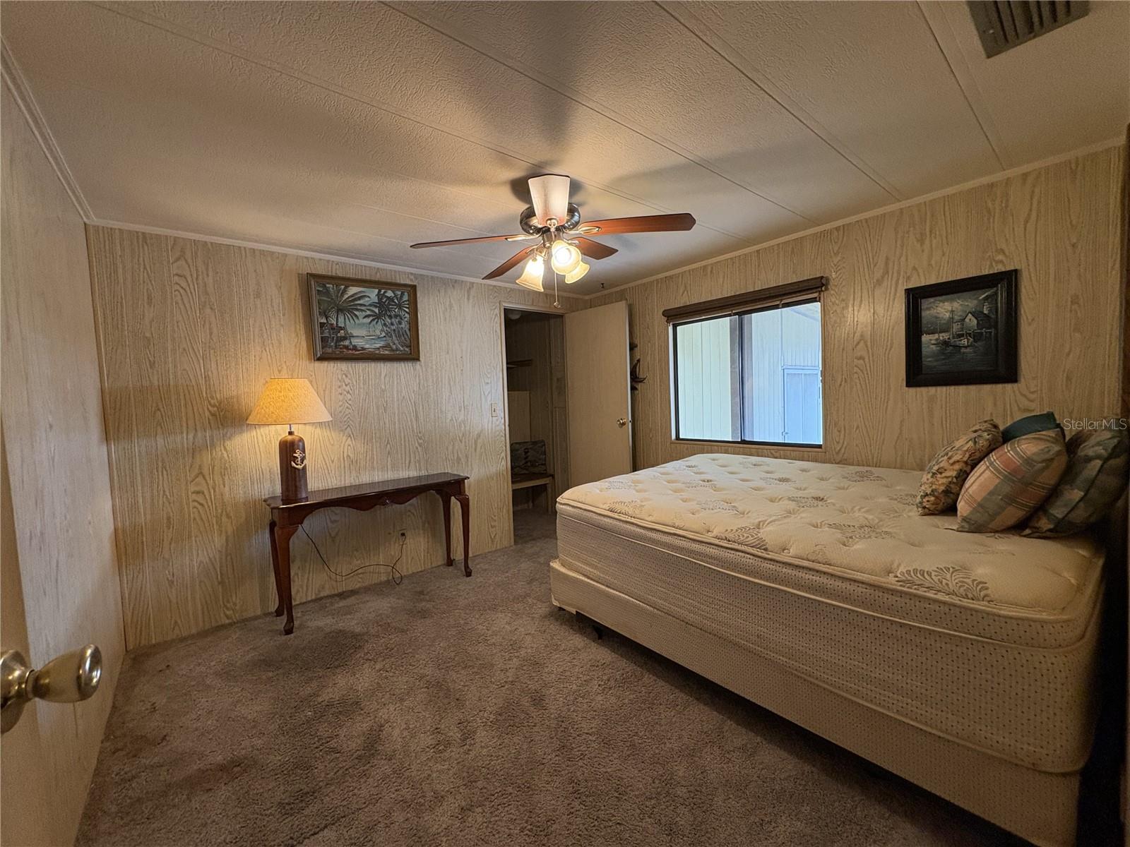 Guest bedroom with walk in closet