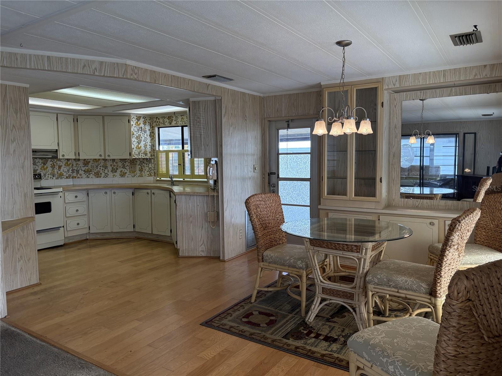 side entry into kitchen from carport