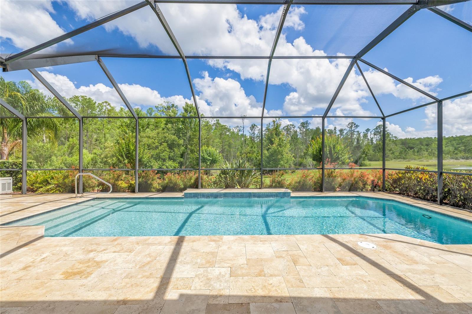 Screened Pool area with travertine