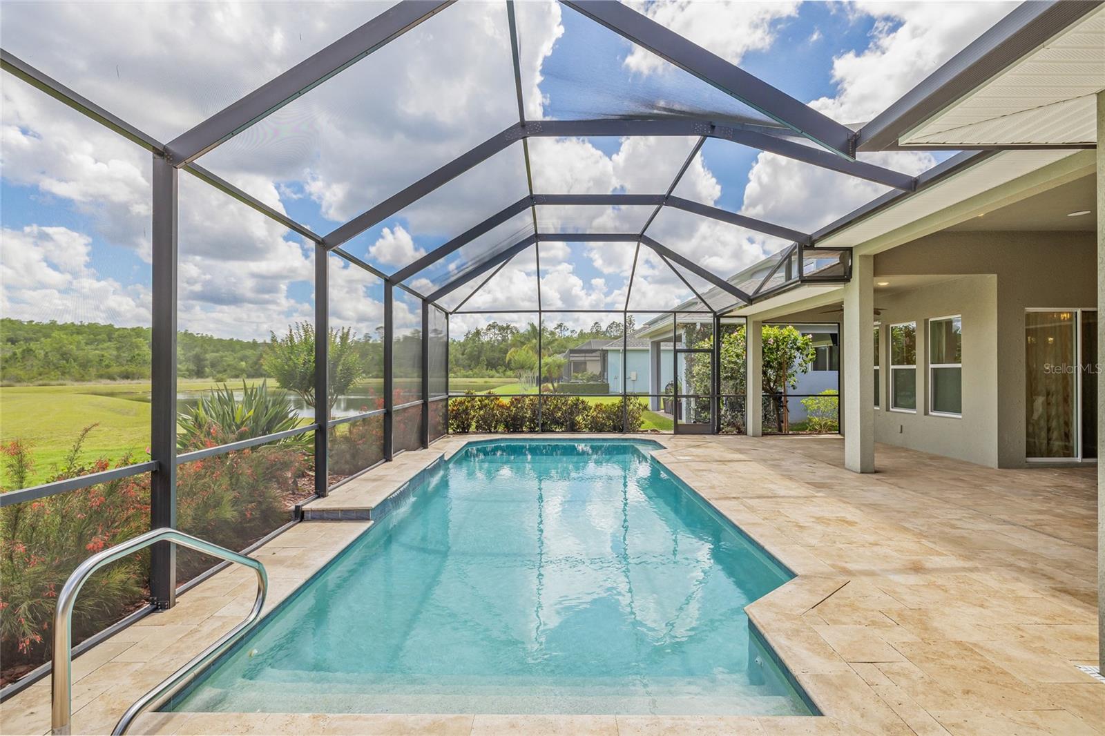 Screened Pool area with travertine
