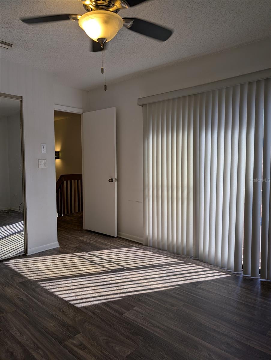2nd Bedroom with sliding door to small balcony