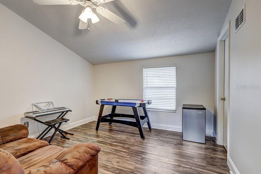 3rd bedroom- upstairs (11x11.8)