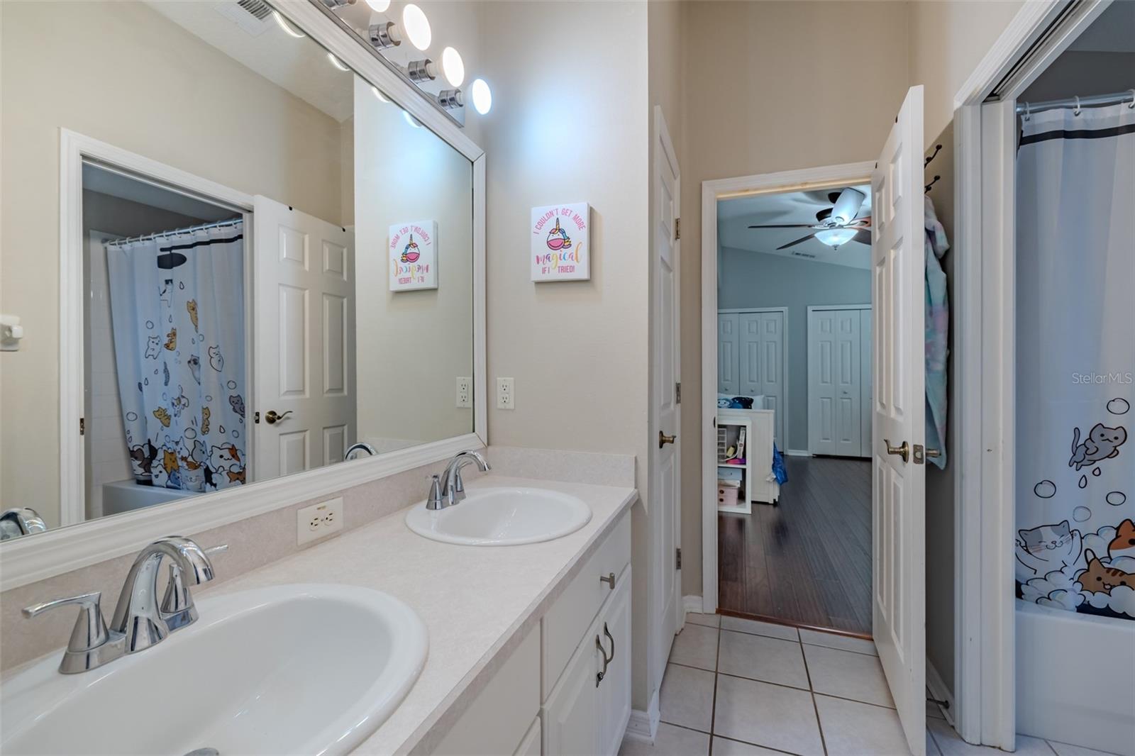 Jack & Jill Bathroom with dual sink vanity PLUS large linen closet!