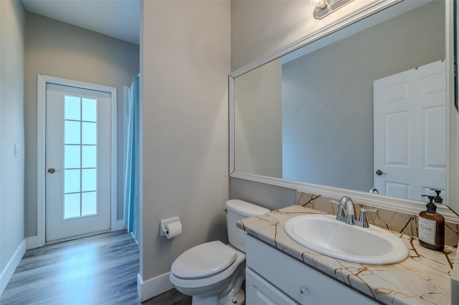 Bathroom #3 has updated Quartzite counter, doubles as POOL bath!