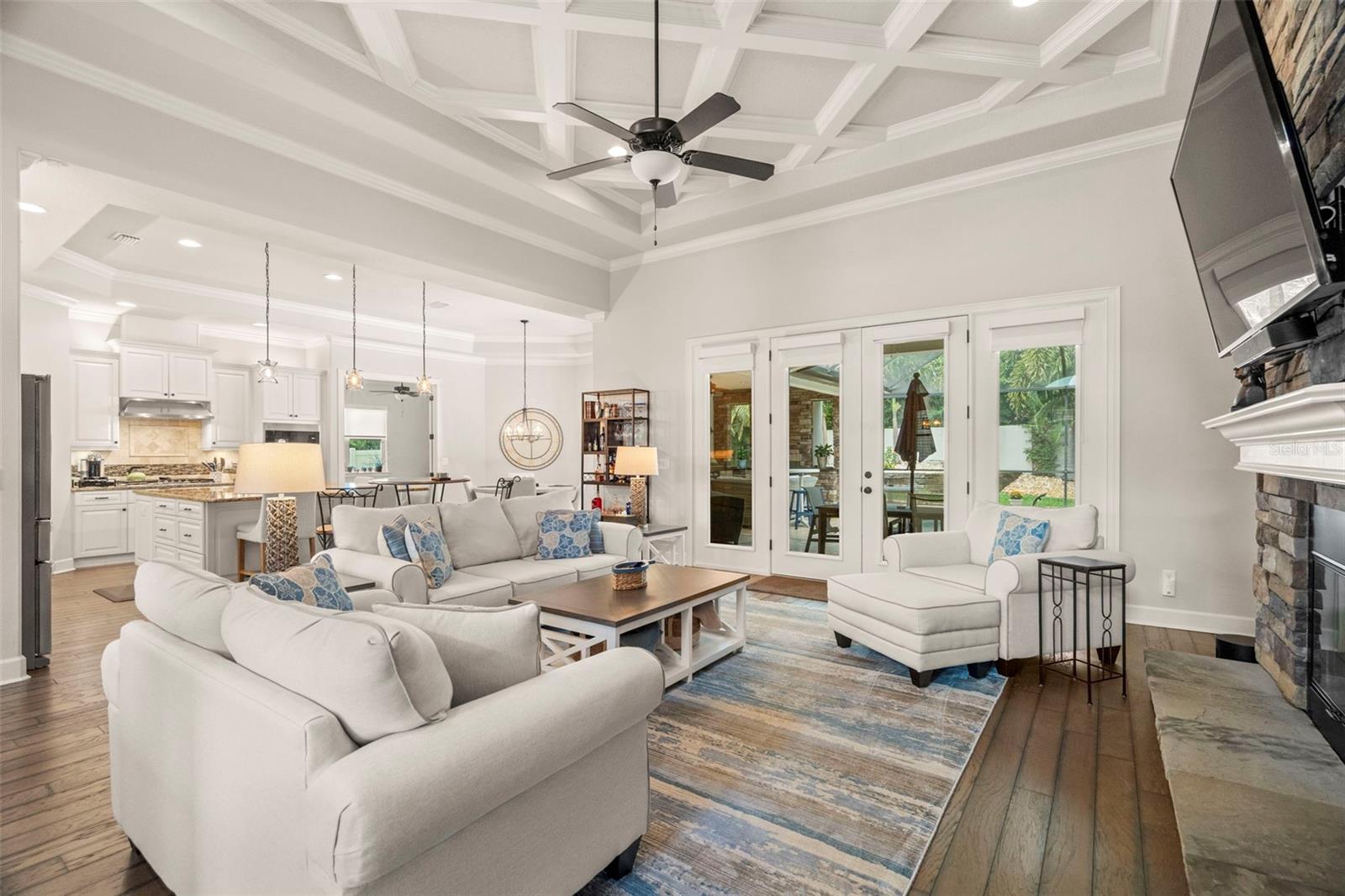 Living room leading out to gorgeous pool area!