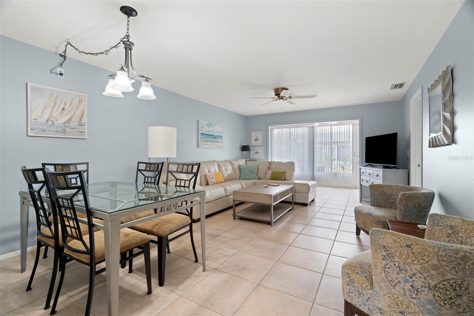 Enter into the bright open dining/living room