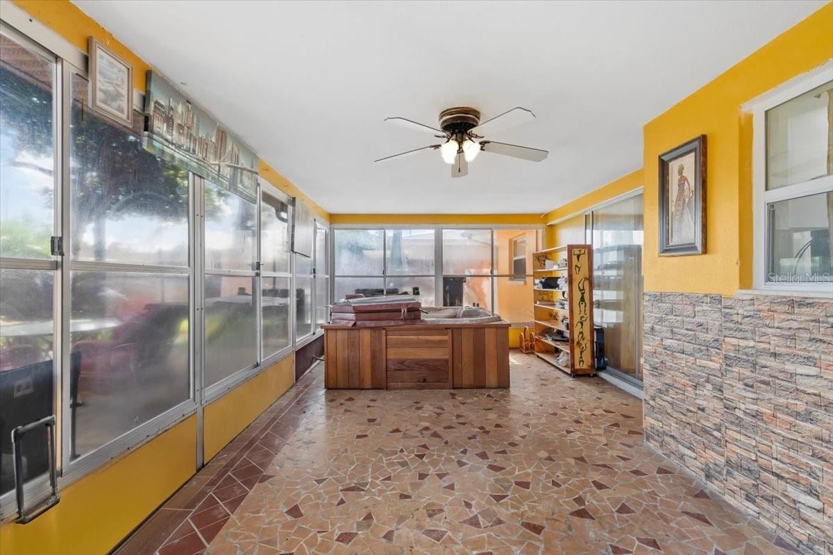 ENCLOSED PORCH WITH JACUZZI