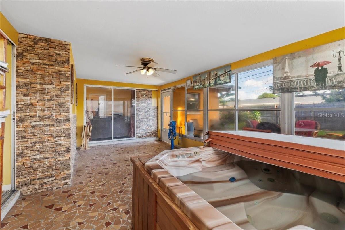 ENCLOSED PORCH WITH JACUZZI
