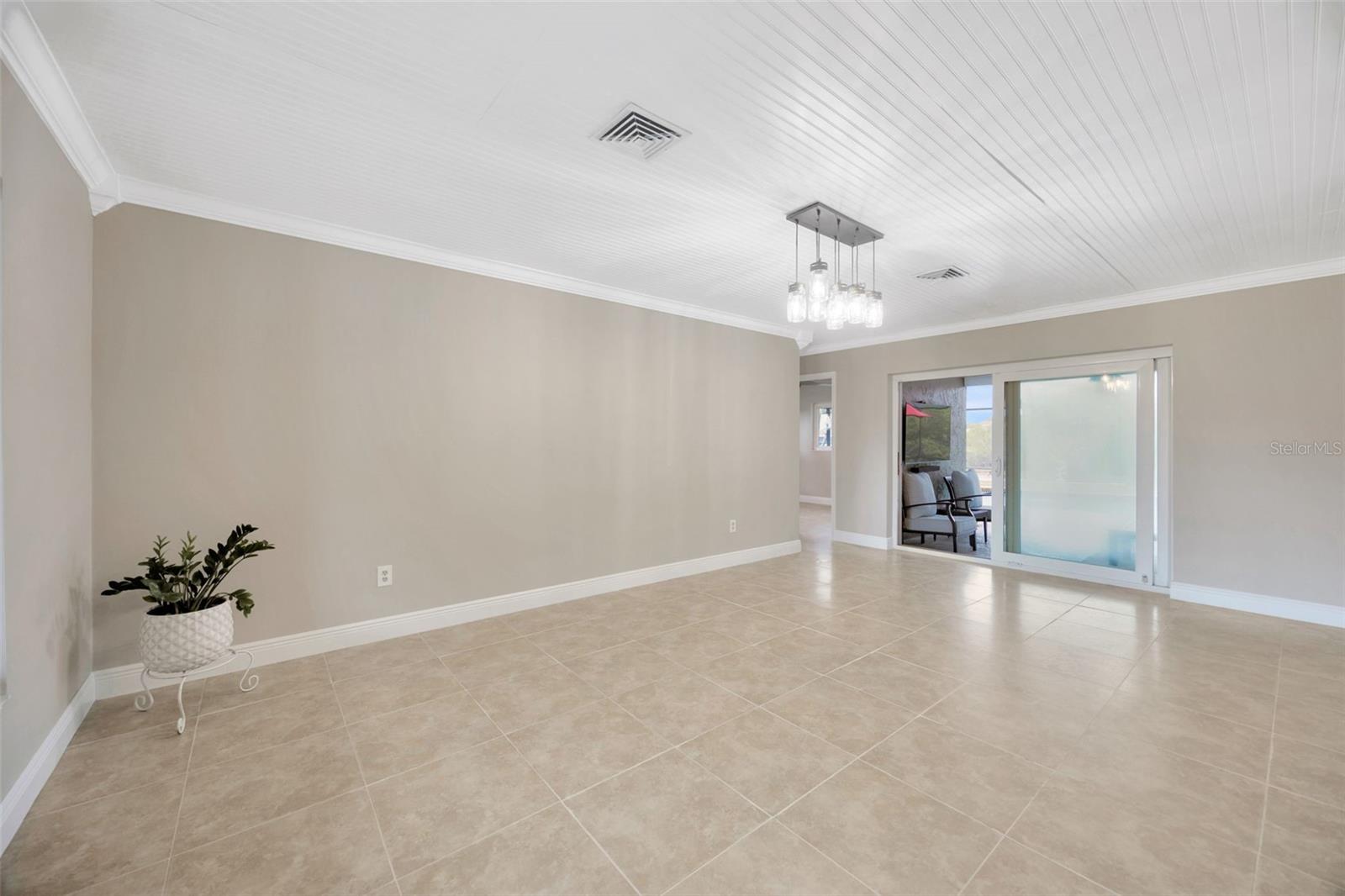 Bright and open living space designed for connection—flowing effortlessly to two cozy bedrooms and your backyard paradise, perfect for relaxing or entertaining.